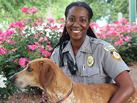 Nice officer with a dog