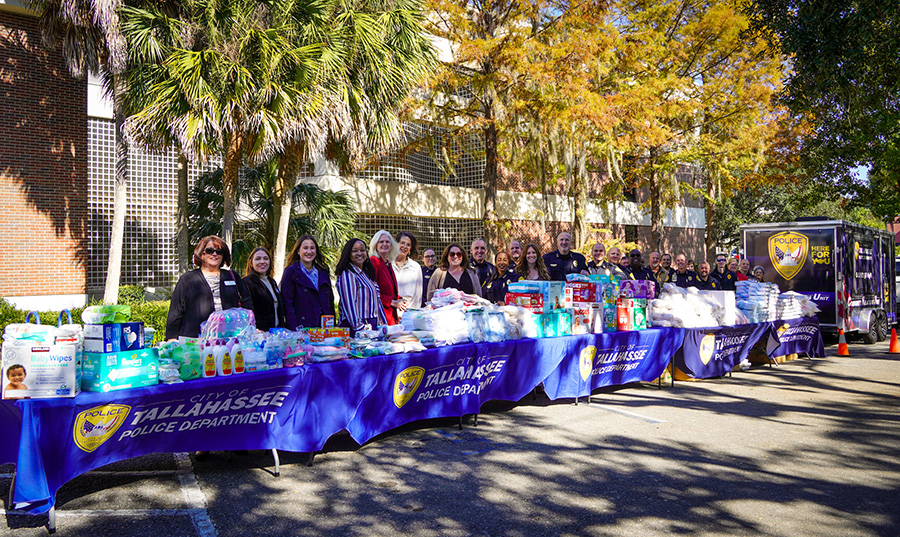 Multiple tables full of supplies for donation