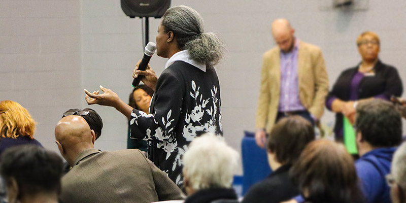 A member of the community speaks at a public hearing.