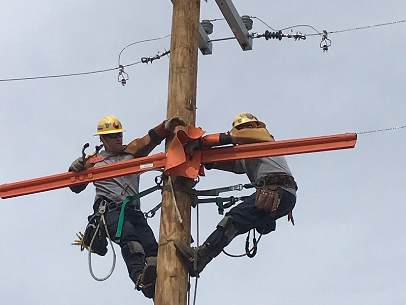 Lineworkers at work